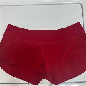 Lululemon Red Athletic Shorts with Moisture-Wicking Fabric and Curved Hem 8